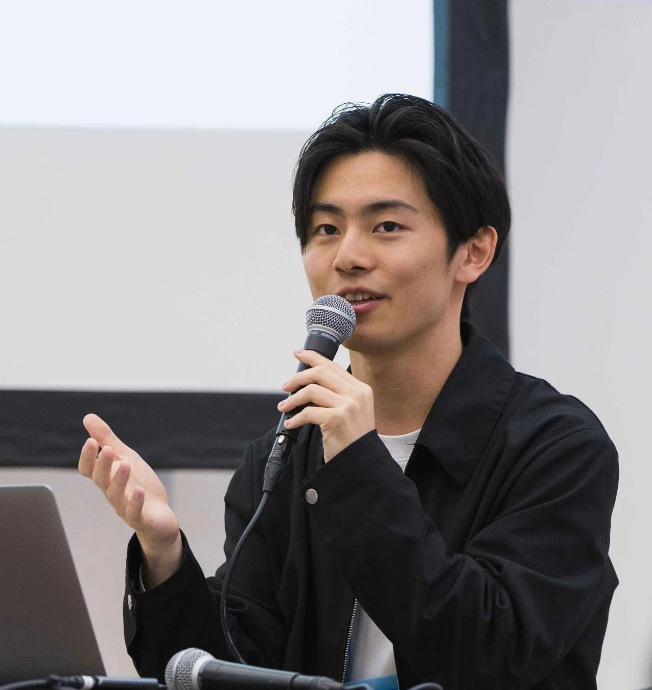 マイクを持って話す株式会社SOI 代表取締役 熊田裕介氏